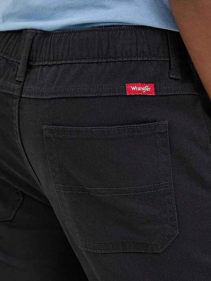 pantalón cargo wrangler free to stretch para niño 8-16 color negro george