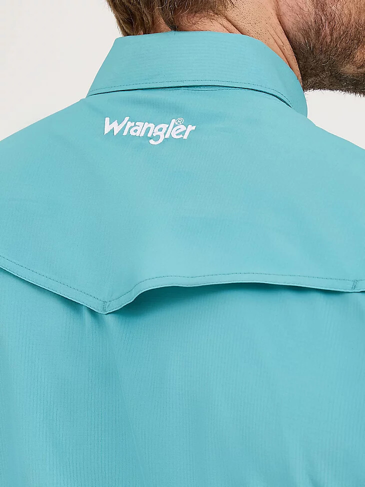 camisa wrangler performance de manga corta con broches a presión para hombre color verde azulado apagado