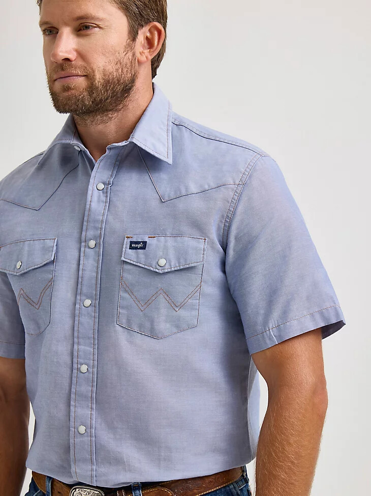 camisa de trabajo de manga corta con cierre de presión estilo western de chambray liso de corte vaquero chambray